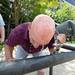 Dennis Wadhams cools off at a water fountain as temperatures reach the 90s, Friday, July 19.
Courtney Sacco I AnnArbor.com 
